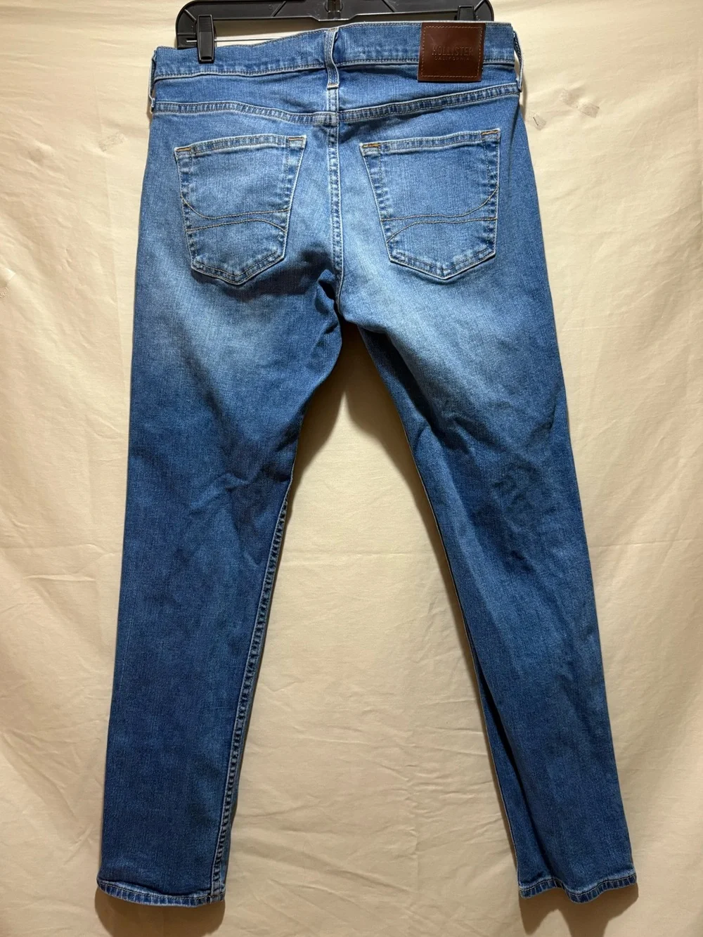 Hollister Men’s 30x30 Slim Skinny Jeans in Mid Wash Blue with Light Distressing
